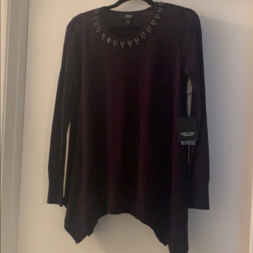 Dark purple sweater with embellishments